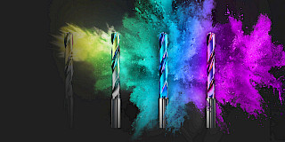 Verschiedene Bohrköpfe von Oerlikon Balzers vor einem bunt-explosiven Hintergrund